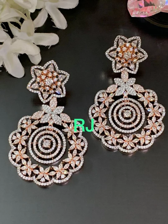 Product image with price: Rs. 1199, ID: dual-tone-plated-diamond-earrings-76dc76c4