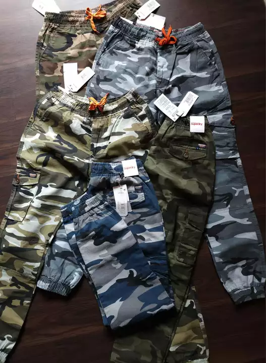 *SUPERDRY*

*↗️PREMIUM ANKLE CARGO 6 - POCKET JOGGERS WITH FLAP*

*FABRIC = 100% COTTON TWILL CAMO P uploaded by Yahaya traders on 5/30/2024