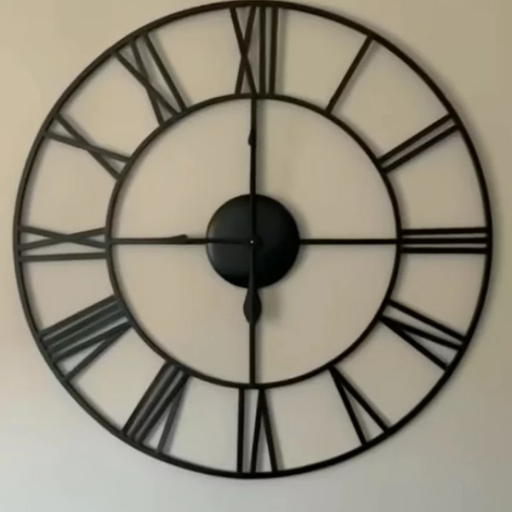 Metal wall clock  uploaded by business on 1/21/2023