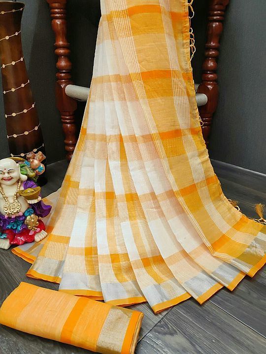 Post image this orijnal linen fabric saree 
fabric = linen 
saree size = 5.5 mtr
blouse = 0.8 mtr