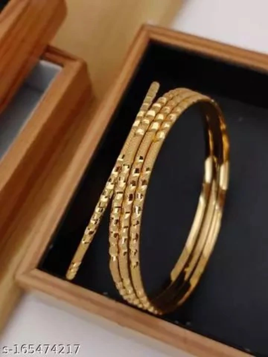 Gold bangles uploaded by business on 1/25/2023