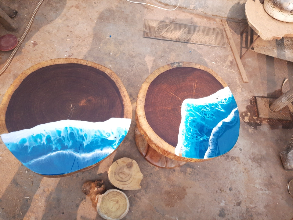 Hand made epoxy table. Sheesham wood top.  uploaded by Bottart on 1/31/2023