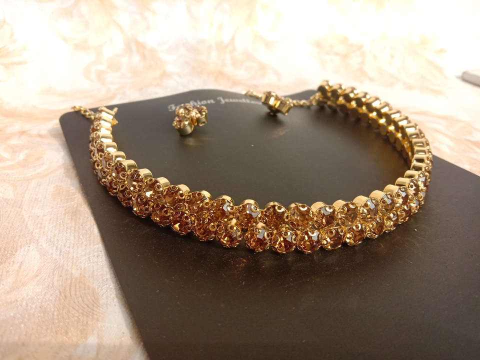 Golden colour necklace  uploaded by Pushp gallery  on 2/1/2023