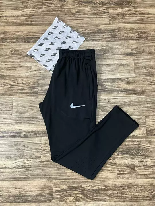 *Mens # Track Pants*
*Brand # N i k e*
*Style #  Df Micro Lycra 4 Way #240 Gsm With Laser Cut*

Fabr uploaded by Rhyno Sports & Fitness on 2/1/2023
