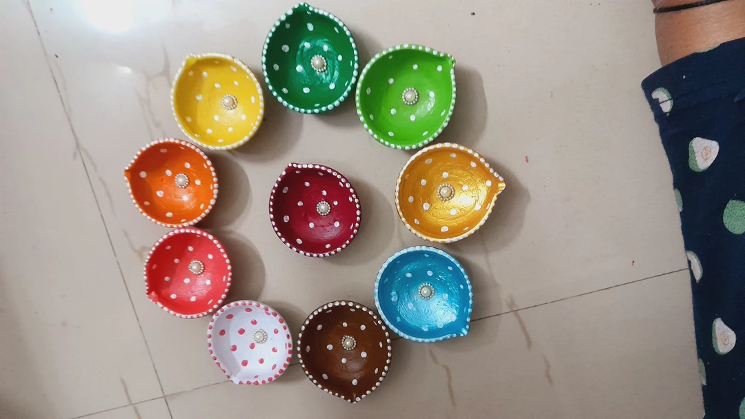Painted clay diya uploaded by business on 2/2/2023