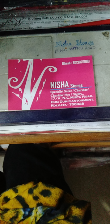 Visiting card store images of Nisha Stores