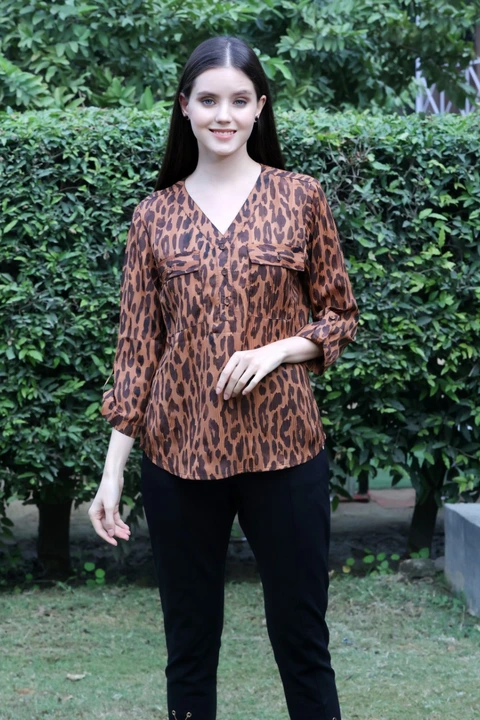 Post image Leopard print top with front placket buttons and pockets
