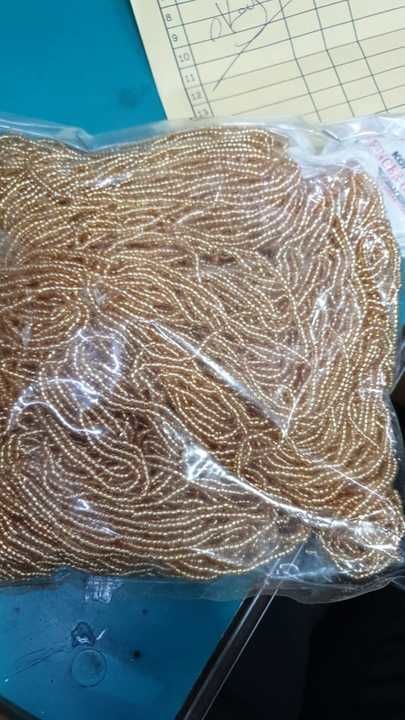 Glass beads bunch golden 450 grams shipping extra price negotiable on quantity Black also available uploaded by business on 2/18/2021