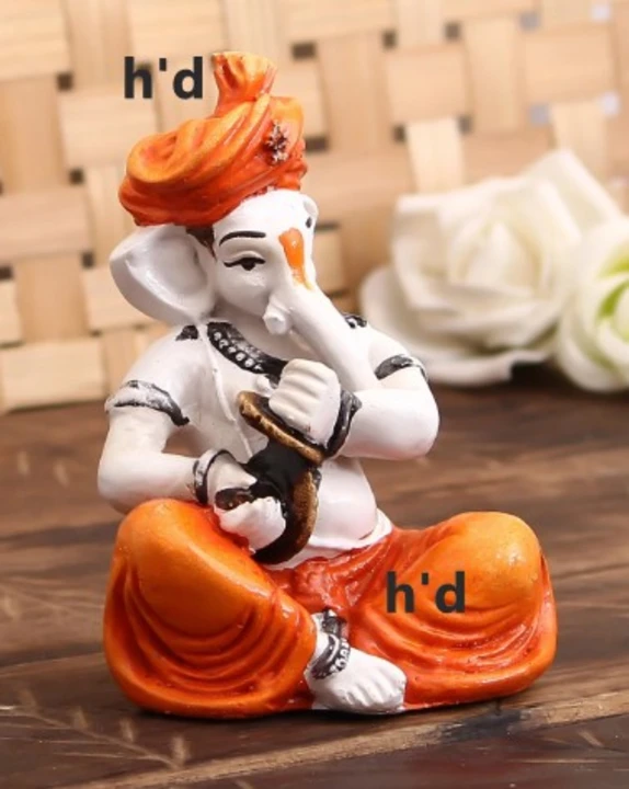 Lord Ganesha Idol Playing Manjira Decorative Showpiece  uploaded by Home decor on 5/31/2024