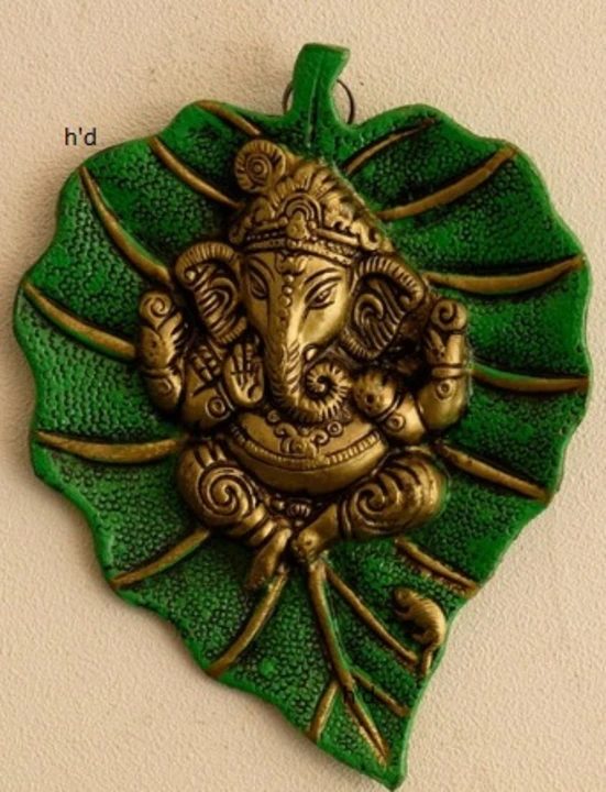 White Metal Golden Lord Ganesha On Green Leaf wall hanging  uploaded by Home decor on 5/30/2024