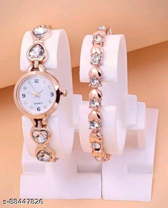 Post image Ronical Analog White Dial Watch With Heart Shape Rosegold Bracelet Combo For Womens And Girls Pack Of 2 Analog Watch
Name: Ronical Analog White Dial Watch With Heart Shape Rosegold Bracelet Combo For Womens And Girls Pack Of 2 Analog Watch
Strap Material: Stainless Steel
Case/Bezel Material: Stainless Steel
Case: Oval
Clasp Type: Buckle
Date Display: No
Dial Color: White
Dial Design: Solid
Dial Shape: Round
Dual Time: No
Gps: No
Light: No
Mechanism: Quartz
Power Source: Battery Powered
Scratch Resistant: No
Shock Resistance: No
Water Resistance: No
Add On: Bracelets
Net Quantity (N): 2
Order this lovely women’s combo of bracelet with watch for yourself or as a unique gift for a special someone, and be sure to win their appreciation! Christmas, Birthday, Valentines’ Day, Anniversary, wedding no matter the occasion this combo of watch with bracelet will definitely impress anyone! It is designed to maintain its brilliance over time when simple care practices are observed; remove before contact with water, lotions or perfumes to extend your precious watch and bracelet’s life.
Sizes: 
Free Size (Dial Diameter Size: 32 mm) 

Country of Origin: India.                                                 Price 250