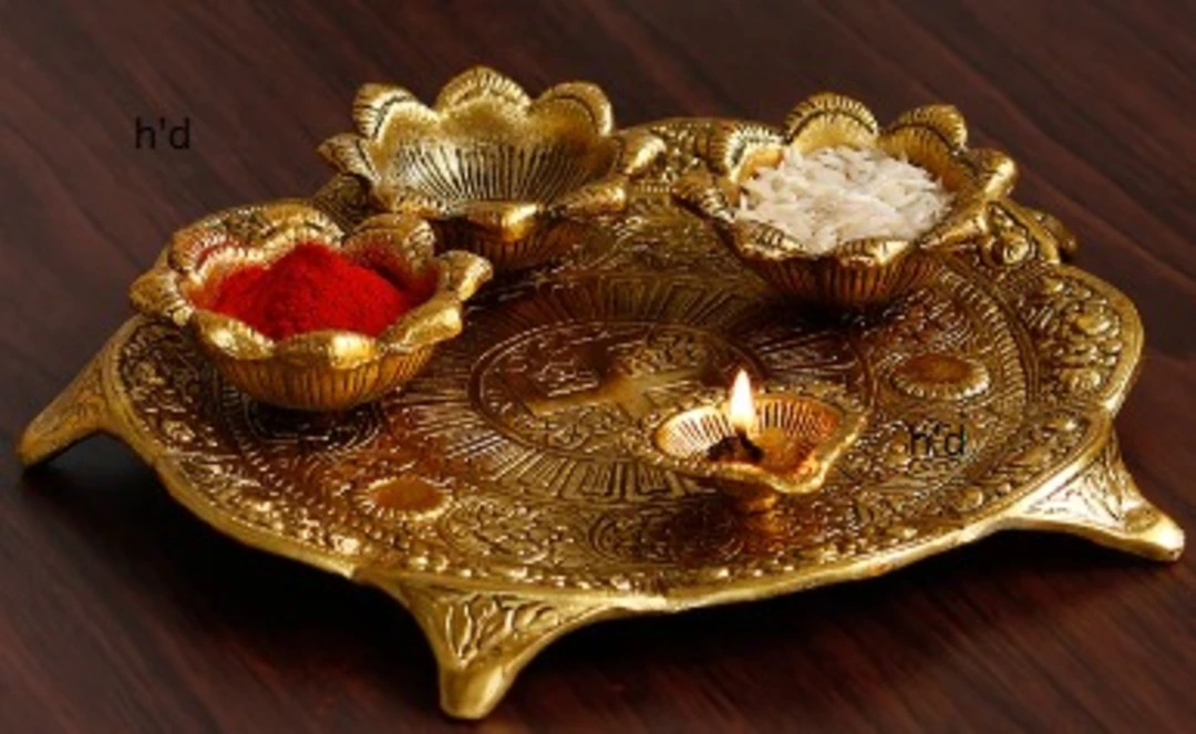 Swastik Design Golden Metal Pooja Thali with 3 Bowls and 1 Diya  uploaded by Home decor on 5/31/2024