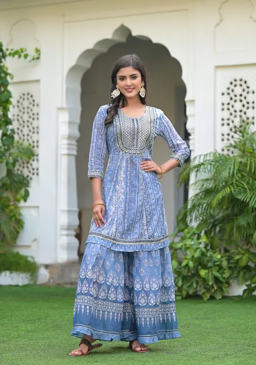 Enjoy the Indian summer in this *cotton peplum sharara set*, available in a range of soft colours. 
 uploaded by Agarwal Fashion  on 2/10/2023