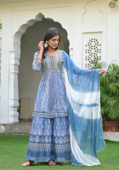 Enjoy the Indian summer in this *cotton peplum sharara set*, available in a range of soft colours. 
 uploaded by Agarwal Fashion  on 2/10/2023