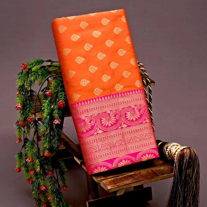 Beautiful orenge saree uploaded by Dhananjay Creations Pvt Ltd. on 2/13/2023