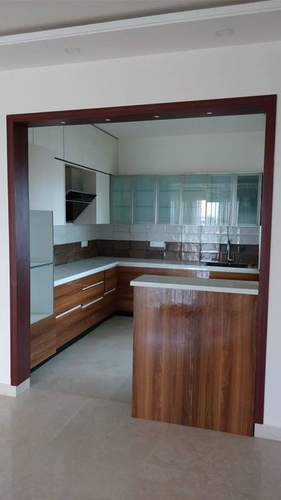 L Shape Wooden Modular Kitchen - Sharma Contracting Company | Sharma Furniture uploaded by Sharma Contracting Company on 2/21/2021