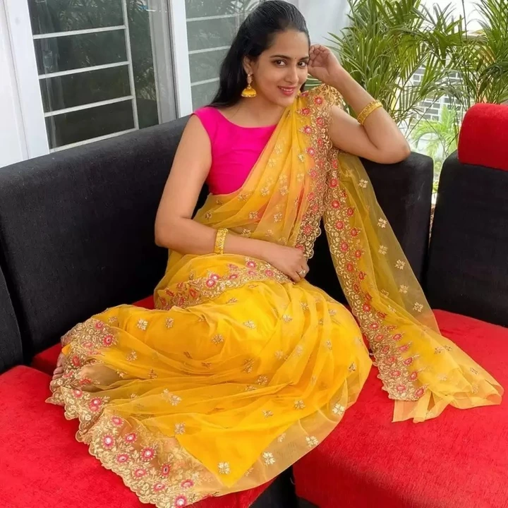 Yellow colored net embroidered saree uploaded by Celeb Styles on 2/15/2023