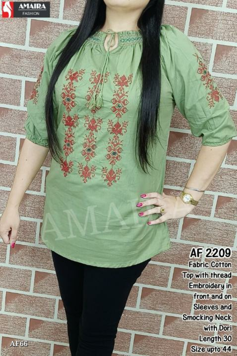 Post image Catalog Name: *Top*

Fabric Cotton Top with thread Embroidery in front and on Sleeves and Smocking Neck with Dori 
Length 30,
Free Size upto 44
(good quality items, at wholesale prices)