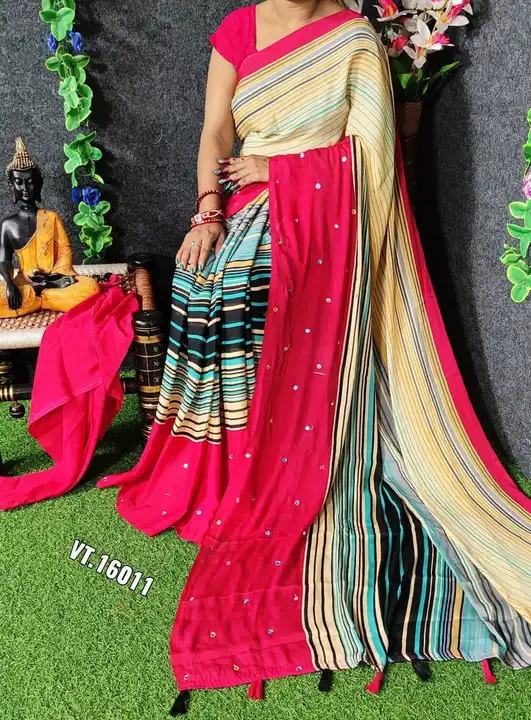 Beautiful mul mul Georgette saree with stripes print allover body  and mirror work on border and tus uploaded by Vishal trendz 1011 avadh textile market on 2/17/2023