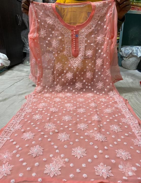 Post image *☑️Cross keel kurti*

☑️Size38to44
☑️Length 46
☑️Fabric Georgette

*☑️Price. 1050*
*☑️Free shipping*.    
contact number-8777878337/8420756858