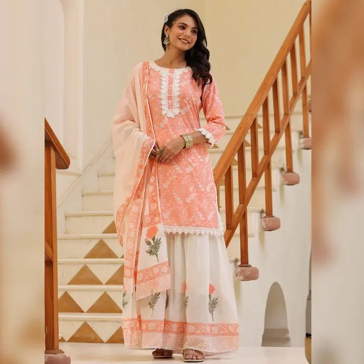 ➡️Feel the comfort of cotton fabric with this amazing coral pink festive wear printed sharara suit😍 uploaded by Ladies_Wear on 2/21/2023