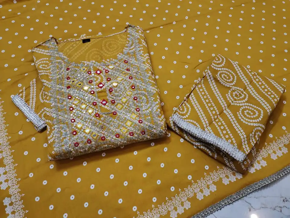 Beautiful Rayon Fabric Bandhani Printed Kurti Nayara Cut With Pant And Printed Dupatta Set  uploaded by Shree Dayal and Company on 2/21/2023