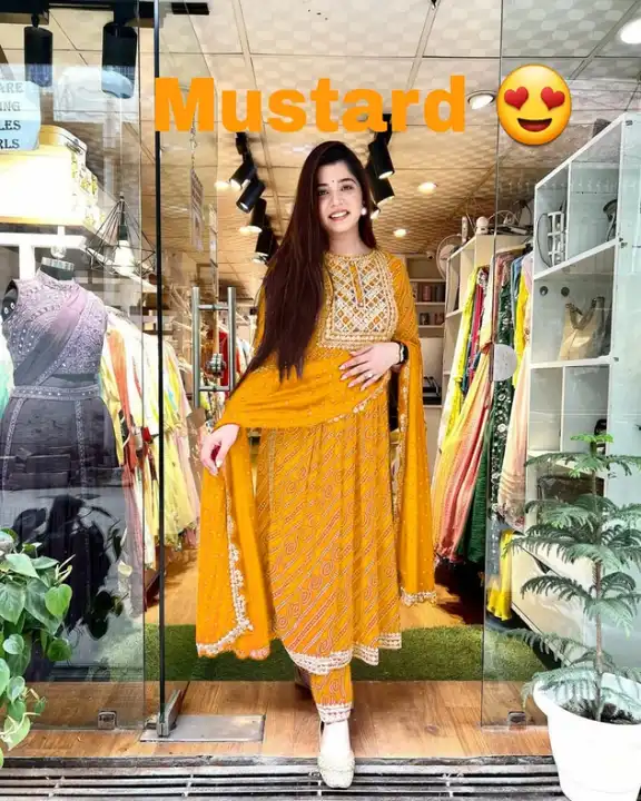 Beautiful Rayon Fabric Bandhani Printed Kurti Nayara Cut With Pant And Printed Dupatta Set  uploaded by Shree Dayal and Company on 2/21/2023