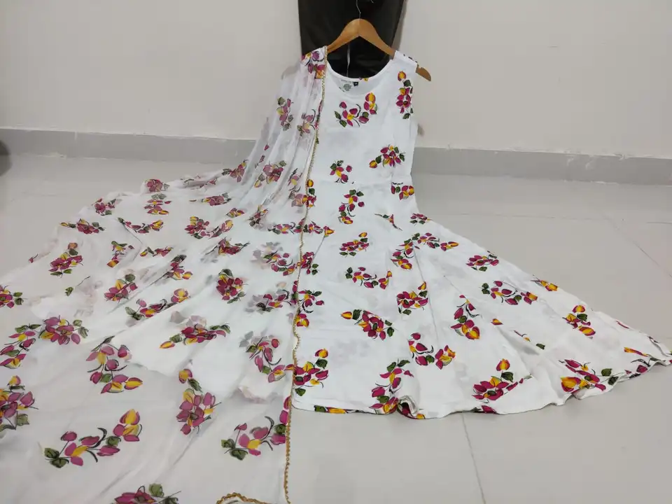 Beautiful Heavy Rayon Gown With Flowers Print Nazmin Dupatta uploaded by Shree Dayal and Company on 2/21/2023