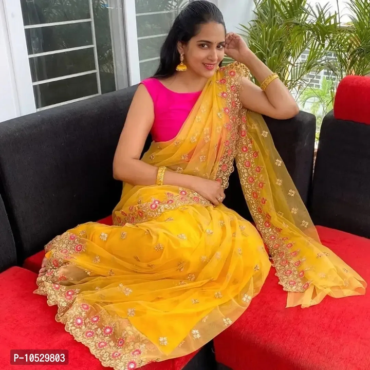 Yellow Net Saree

 Color:  Yellow

 Fabric:  Net

 Type:  Saree with Blouse piece

 Style:  Embroide uploaded by business on 2/25/2023