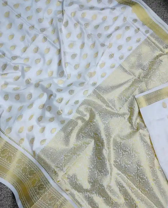 White satin silk saree with gold zari work
Length - 6 mtrs
Weight - 850 gms
Scott border 
 uploaded by Salik Garments on 2/25/2023