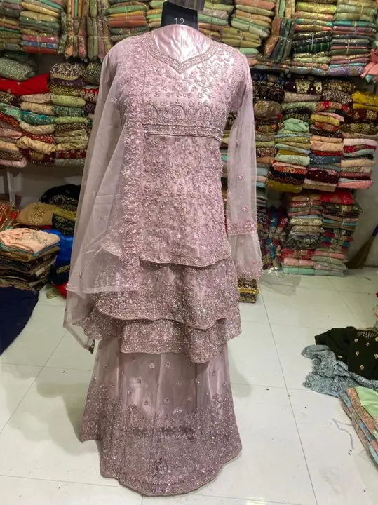 Net triple frill top with ghagra uploaded by Humera fashion on 2/25/2023