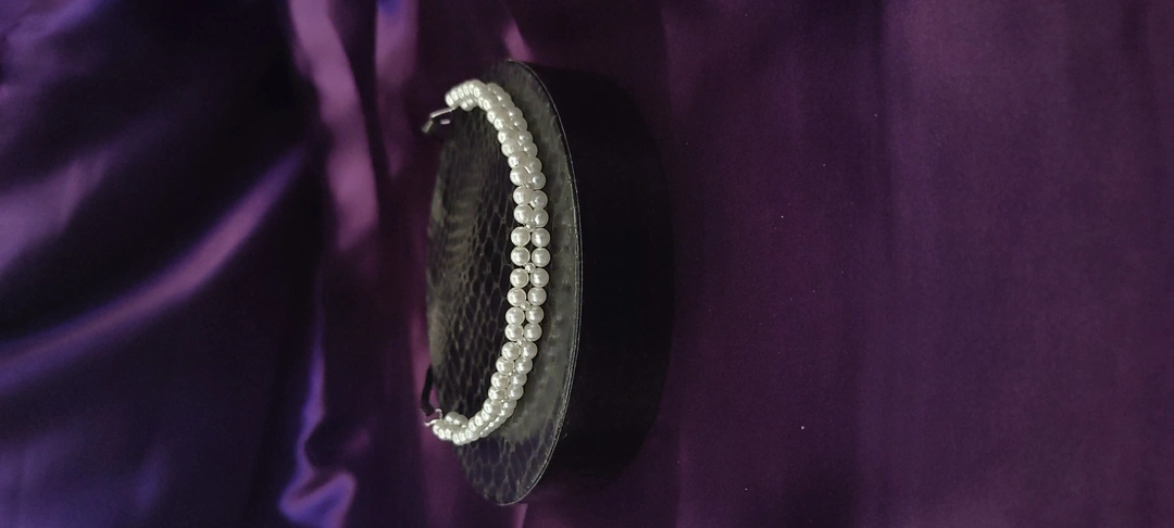 Product image of Handmade Pearl Tiaras, price: Rs. 99, ID: handmade-pearl-tiaras-32fb25ef