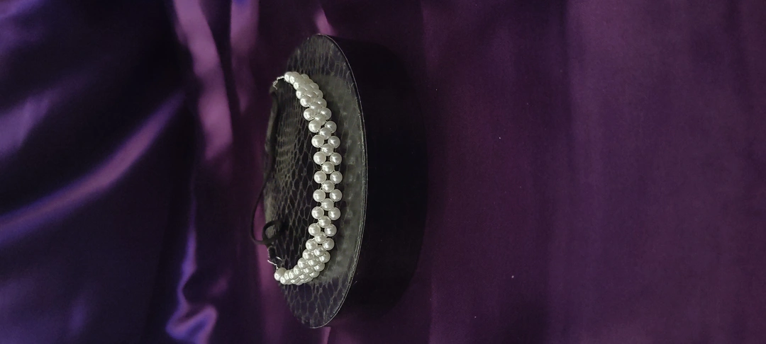 Product image of Handmade Pearl Tiaras, price: Rs. 120, ID: handmade-pearl-tiaras-e4c884ff