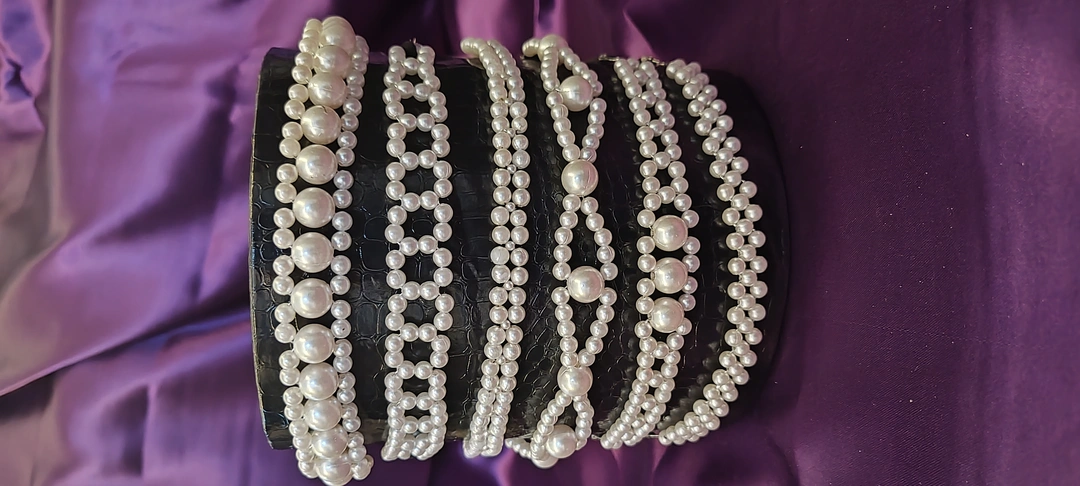 Product image of Handmade Pearl Tiaras, price: Rs. 129, ID: handmade-pearl-tiaras-638ed730