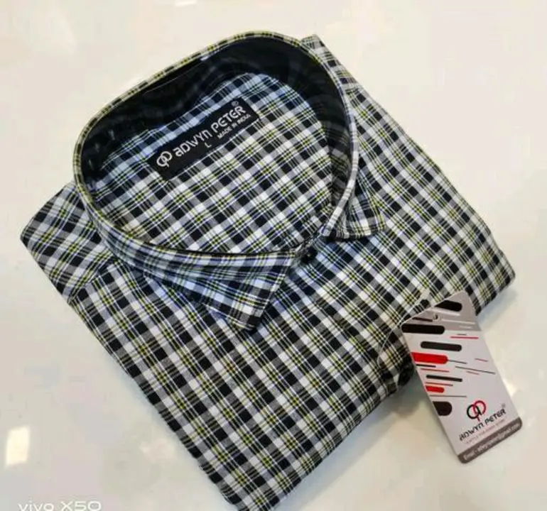 Checks shirt uploaded by business on 3/1/2023