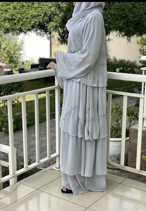 Nida imported abaya  trendy feathers layer look uploaded by Urban boutikeez on 2/23/2021