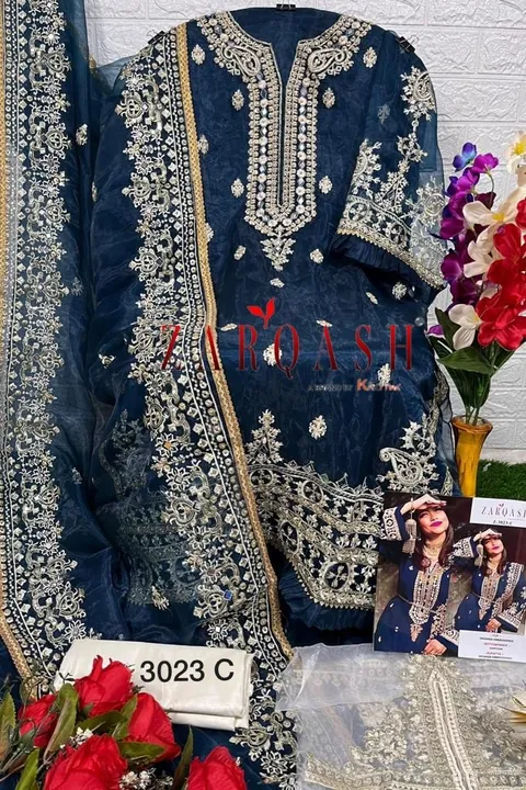 *ZARQASH suits ®️*

*D.NO :- Z-3023*

*Total 12 colour*

*FABRIC DETILAS*

*Top :- organza with embr uploaded by Aanvi fab on 3/3/2023