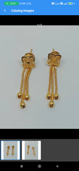Gold plated drop earrings with metal pench uploaded by business on 3/4/2023