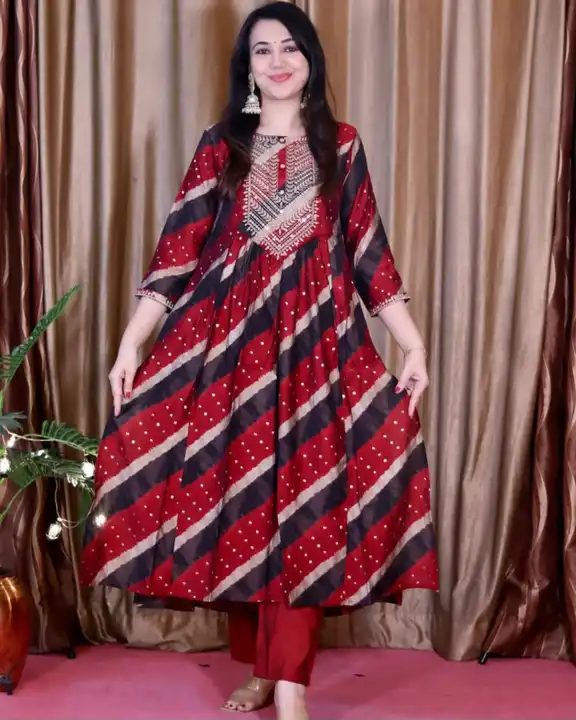 *Women's day special*

*Look stylish in this Pure Rayon  print Long nayra cutv kurta pant set👗🛒*
 uploaded by Ayush Handicarft on 3/9/2023
