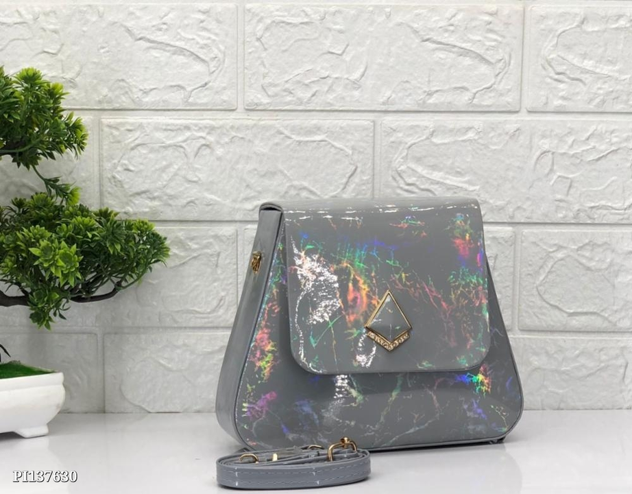 Glossy sling bag uploaded by pink Rose fashion Store  on 3/9/2023