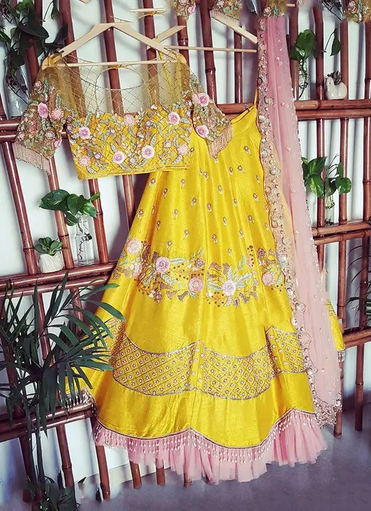 Yellow Colored Party Wear Peach Colored Dupatta Bridesmaid Lehengas With Embroidery Work uploaded by Ashokawholesellarfashionstore on 3/13/2023