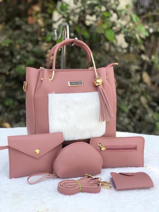 Post image New model 
5 pis combo 
Jimmy choo
Single zip back side zip 
Pu leather &amp; far material 
Very good quality


Price : *500*  only 👜👜

Free shipping ❤️