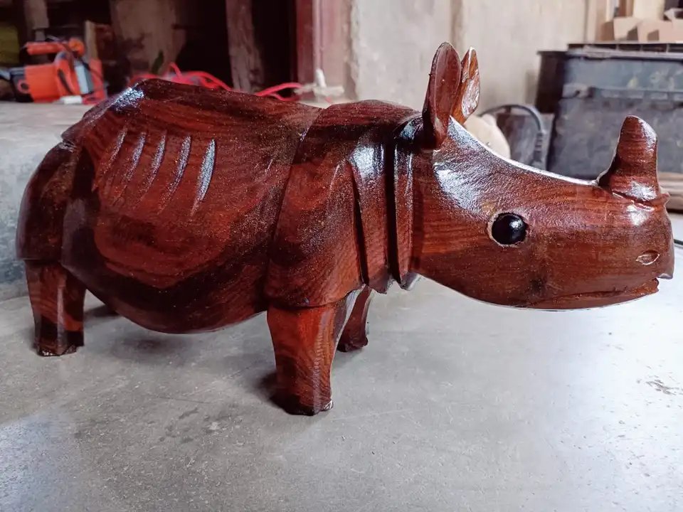 Wooden Rhino of Jaldapara rhino design for showpiece  uploaded by Janani enterprise on 3/15/2023