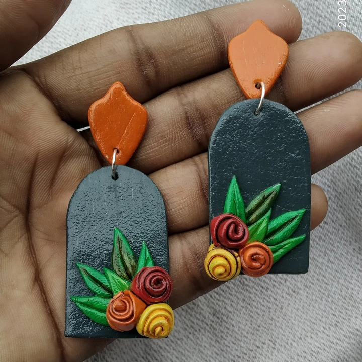 Rose earrings orange gray uploaded by Ratnaabhushan on 5/19/2024