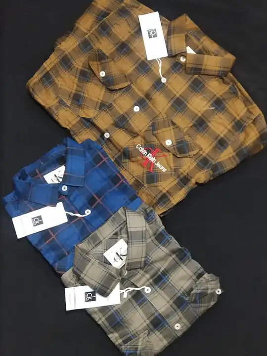 Brand - Ck Double pocket twill check shirt size - M L XL  Set- 18pcs Moq - 50 uploaded by Clothes on 3/17/2023