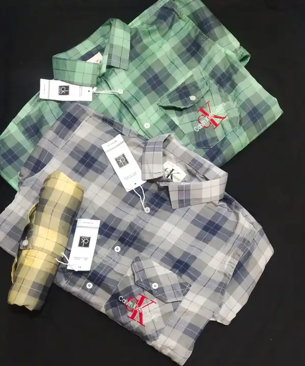 Brand - Ck Double pocket twill check shirt size - M L XL  Set- 18pcs Moq - 50 uploaded by business on 3/17/2023