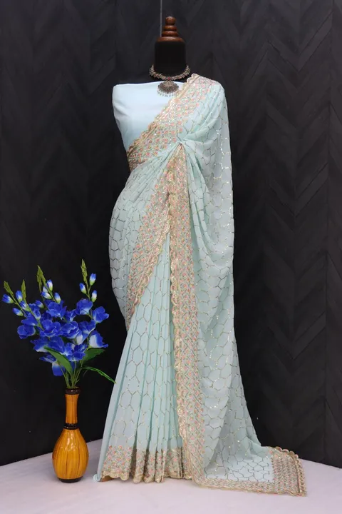  FABRIC:-  Faux georgette

SAREE LENGTH-  5.50 Mtr
  
SAREE WORK:-  3 Mm Seqwance work and multicolo uploaded by Fashion designer saree  on 3/21/2023