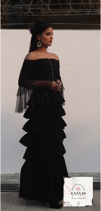 Black Layered skirt with off shoulder circular flared sleeve
 uploaded by business on 2/27/2021