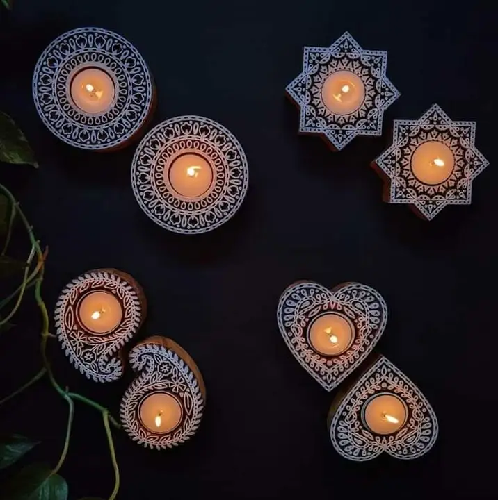 Wooden tea light candle holders uploaded by business on 3/22/2023