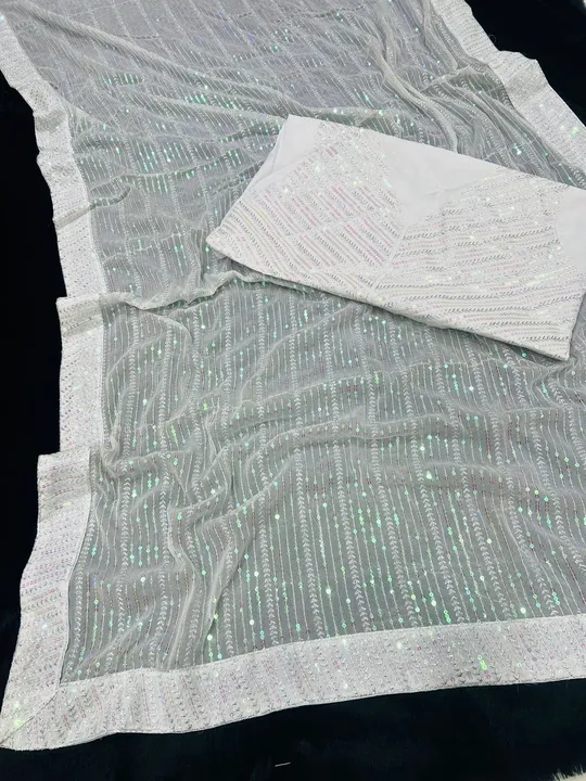 

*Saree Detail*
*Saree Fabric : Georgette*
*Saree Work   : Heavy Embroidery Multy & Sequins(5mm) Wo uploaded by Vishal trendz 1011 avadh textile market on 3/22/2023